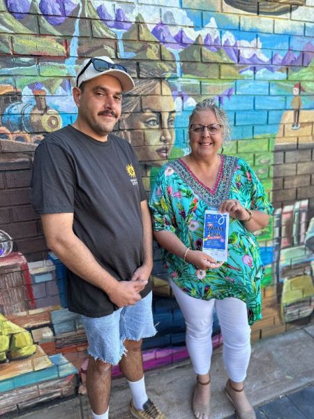 Mayor Linley Shine with Reece Brown from Uniting Country SA with the new Mural Trail guide.